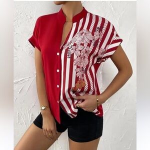 Women’s size medium/large red blouse in new condition